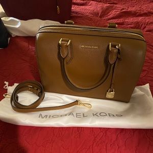 Light brown Michael Kors purse with gold hardware